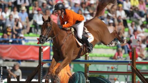 Netherlands' Gerco Schroder rides Glock's London NOP during the Individual Jumping competition of the 2014 FEI World Equestrian Games