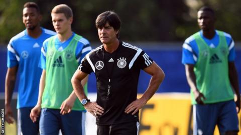 Germany coach Joachim Low watches his players in training