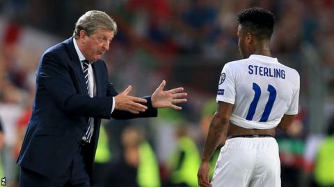 England manager Roy Hodgson (left) and forward Raheem Sterling