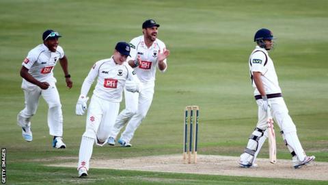 Usman Khuwaja was caught behind by Ben Brown off Ashar Zaidi