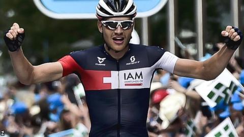 Matthias Brandle celebrates crossing the line
