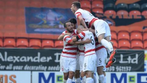Hamilton's Tony Andreu (hidden) celebrates his goal against Dundee United.