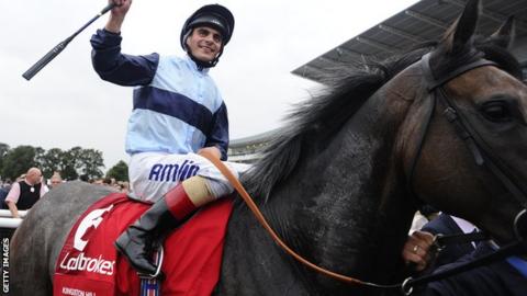 Andrea Atzeni on Kingston Hill after winning the St Leger