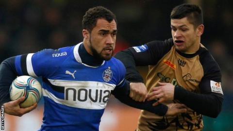 Catalin Fercu (right) and Bath's Olly Woodburn