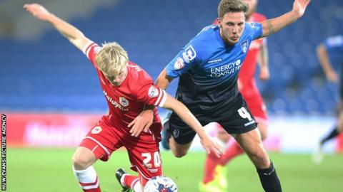 Cardiff's Mats Moller Daehli battles for the ball with Dan Gosling