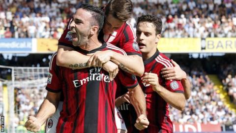 AC Milan celebrate Adil Rami's equaliser at Cesena