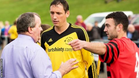 Gary Innes of Fort William and James McMillan (right) of Oban discuss matters with Camanachd Association Director, Charles Young