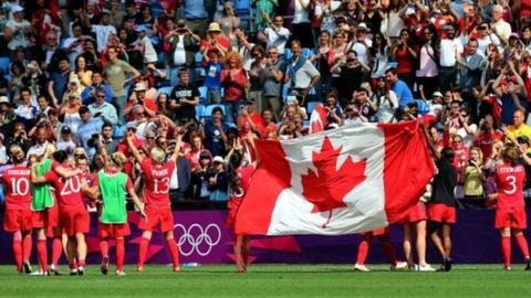 Canada's players celebrate after winning the bronze medal match at the London 2012 Olympic Games