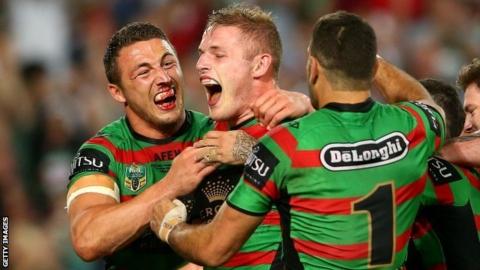 Sam and George Burgess celebrate