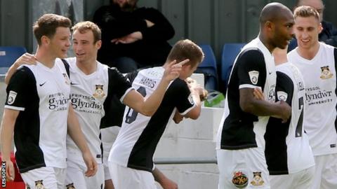Wrexham players celebrate a goal against Alfreton this season