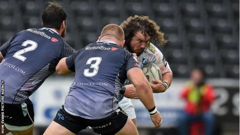 Adam Jones goes on the charge for Cardiff Blues against former side Ospreys