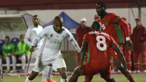 Malawi in action against Algeria