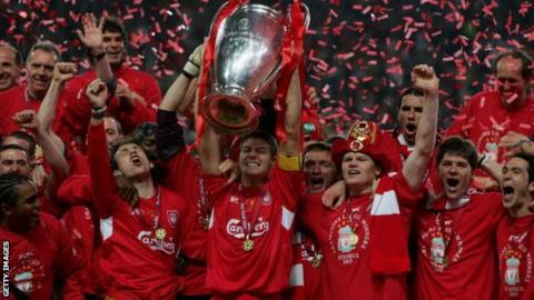 Liverpool captain Steven Gerrard holds the European Cup aloft
