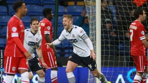 Bolton's Liam Feeney celebrates scoring against Cardiff City