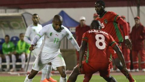 Malawi in action against Algeria