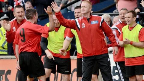 Hurlford United manager Darren Henderson celebrates a Stewart Kean goal
