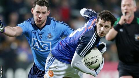 Dublin's Philly McMahon challenges Jamie Clarke of Ulster in the charity match at the Kingspan Stadium