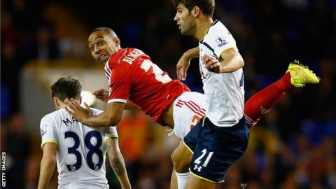 Dexter Blackstock (centre) in action against Tottenham in the League Cup in September