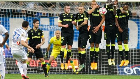 Marseille midfielder Abdelaziz Barrada takes a free-kick against Nantes