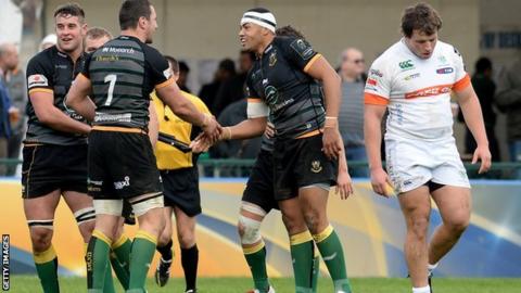 Luther Burrell (centre) is congratulated after scoring Northampton's fourth try