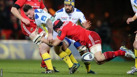 Munster's Tommy O'Donnell tackles Clermont's Thomas Domingo at Thomond Park
