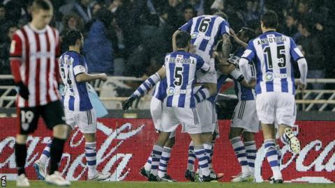 Real Sociedad celebrate taking the lead against Athletic Bilbao inthe Basque derby
