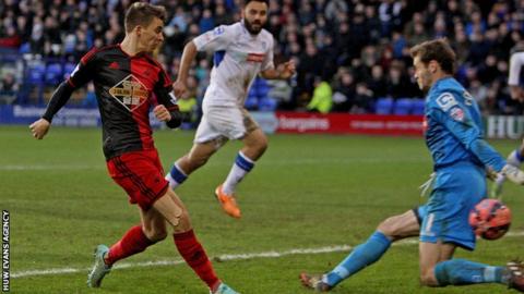 Midfielder Tom Carroll is on a season-long loan from Tottenham at Swansea