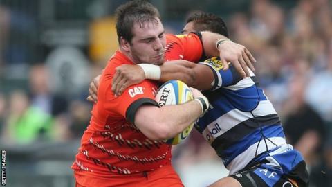 Fraser Balmain (left) is tackled by Bath's Alafoti Fa'osiliva