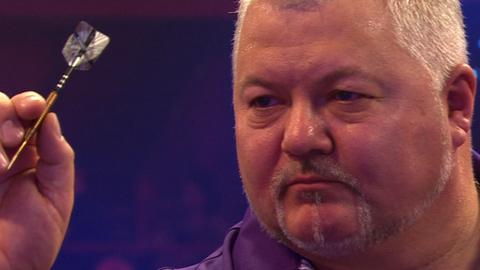 Darryl Fitton eliminates number two seed Alan 'Chuck' Norris in the second round at the BDO World Darts Championship