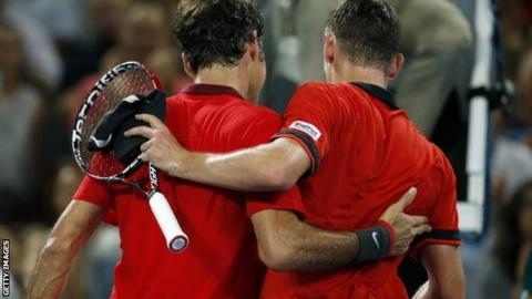 Roger Federer and John Millman