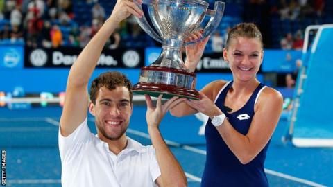 Poland team Jerzy Janowicz and Agnieszka Radwanska celebrate Hopman Cup win