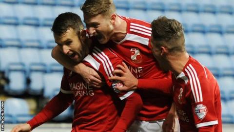 Andy Williams celebrates scoring