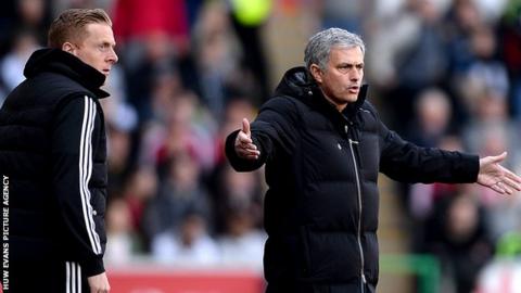 Garry Monk (L) and Jose Mourinho
