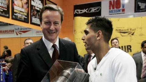 David Cameron (left) and Amir Khan