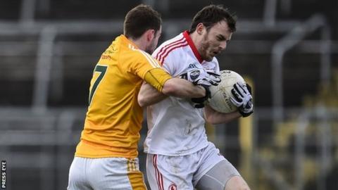 Emmet Killough and Barry Tierney in action at Clones