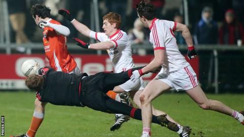 Tyrone keeper Michael O'Neill blocks Jamie Clarke's shot on goal in the semi-final