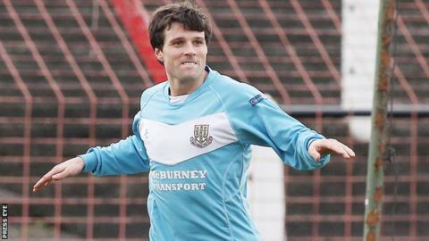 Alan Davidson celebrates after scoring one of two goals against Queen's University in last season's Irish Cup semi-final