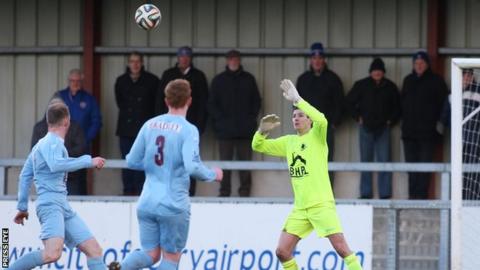 Saul Deeney is unable to stop Matthew Snoddy's lobbed goal in Saturday's game at Drumahoe