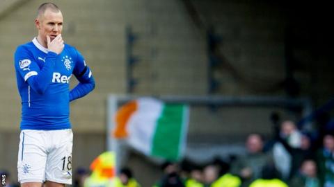 Kenny Miller shows his dejection against Celtic