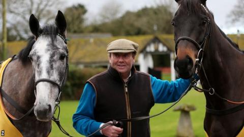 Nicky Henderson with Vasco Du Ronceray (left) and Sign Of A Victory