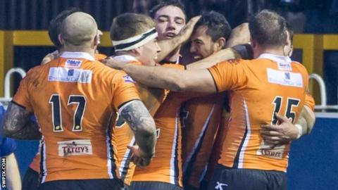 Castleford Tigers celebrate Denny Solomona's last gasp try against Widnes.