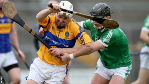 Portaferry goalkeeper Karol Keating battles for possession with Kilmallock's Paddy O'Loughlin