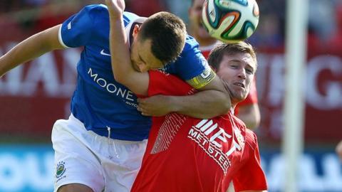 Linfield and Portadown will meet in the pick of the last-eight matches