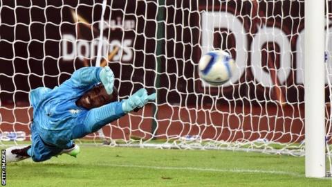 The moment when Boubacar Barry saved a penalty from Razak Braimah in the Africa Cup of Nations final