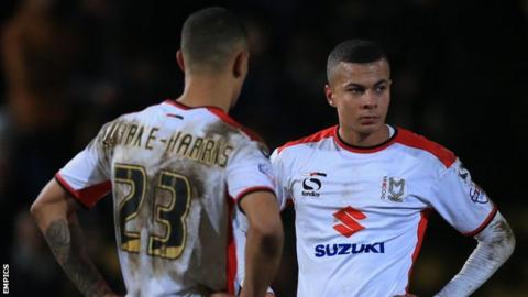 Jonson Clarke-Harris and Dele Alli of MK Dons