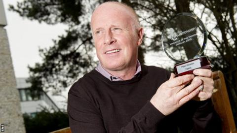 Falkirk manager Peter Houston with his manager of the month award