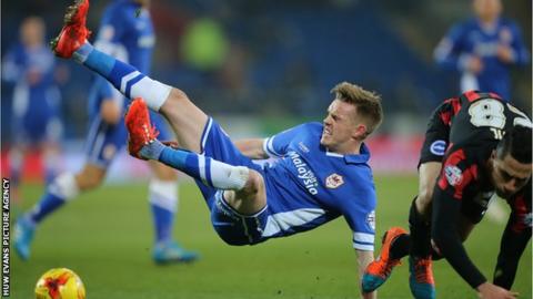 Cardiff City's Craig Noone is brought down by Brighton's Beram Kayal