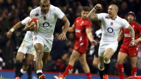 England players celebrate their win over Wales