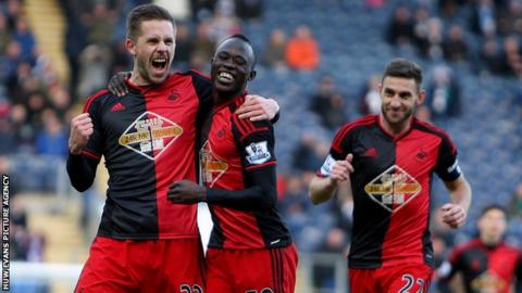 Gylfi Sigurdsson celebrates a goal for Swansea