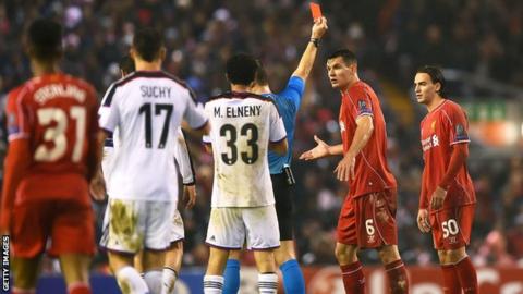 Lazar Markovic (right) shown the red card against Basel